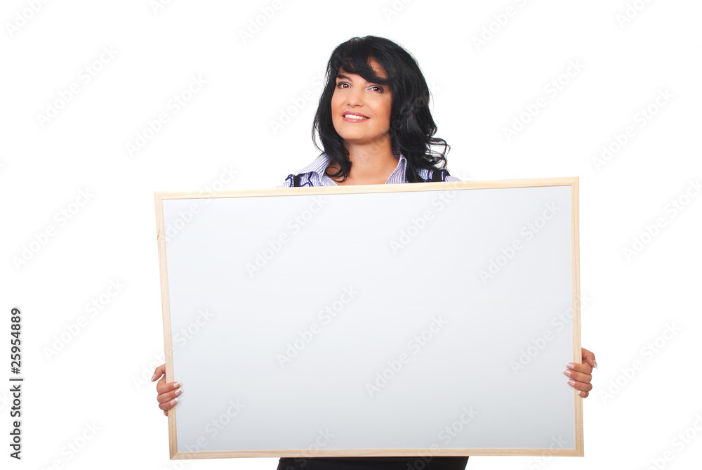 Successful businesswoman holding blank placard Successful businesswoman holding blank placard