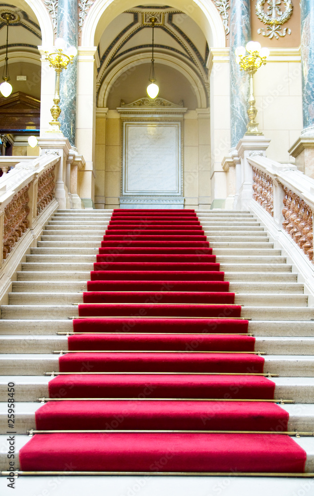 Obraz premium Red carpet on stairs. National Museum in Prague