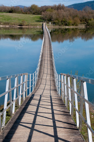 Bridge over a lake in Garaio, Basque Country photo