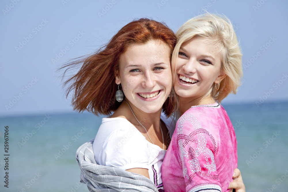 Three girlfriends at the beach. Three girlfriends at the beach.