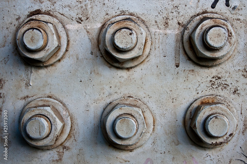 Bolts on metal surface