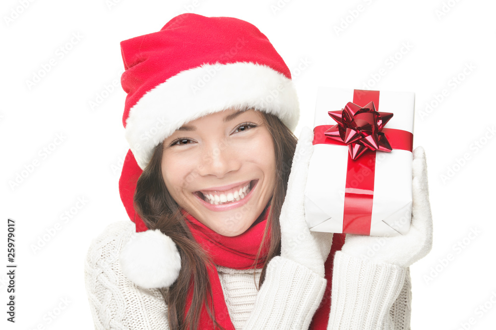 Christmas woman holding gift smiling Christmas woman holding gift smiling