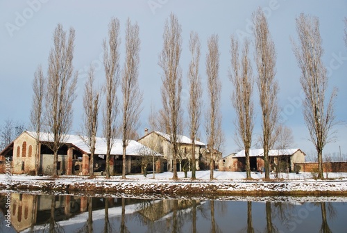 Wallpaper Mural Country house and river in winter, Po valley, Italy Torontodigital.ca