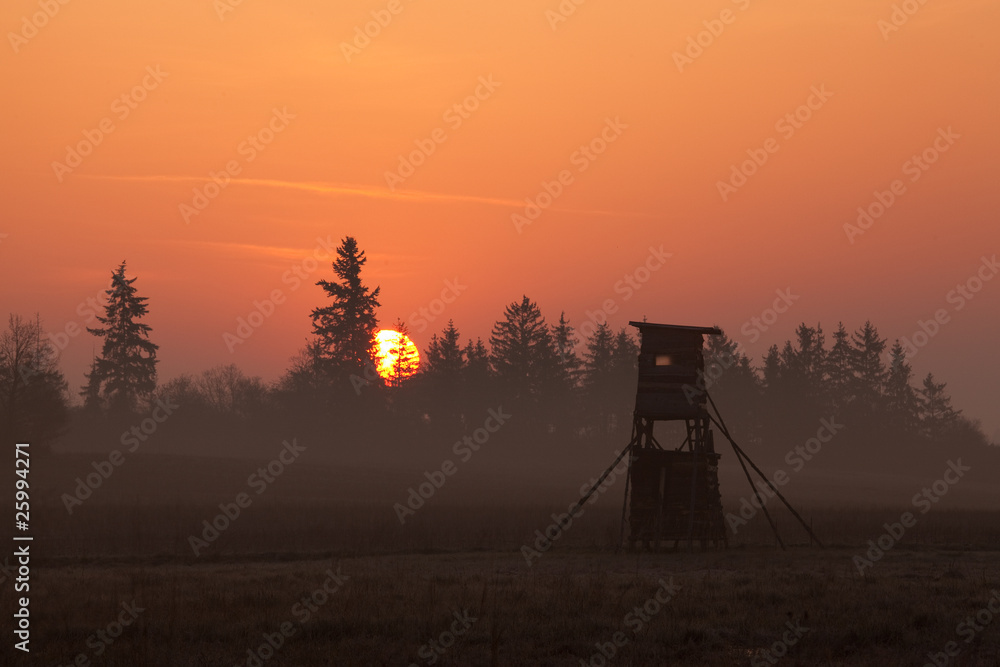 Naklejka premium Hunters tower at sunset in winter