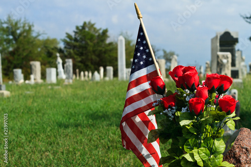 American Flag and in old graveyard