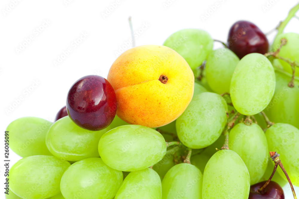 grapes, apricots and cherries isolated on white grapes, apricots and cherries isolated on white