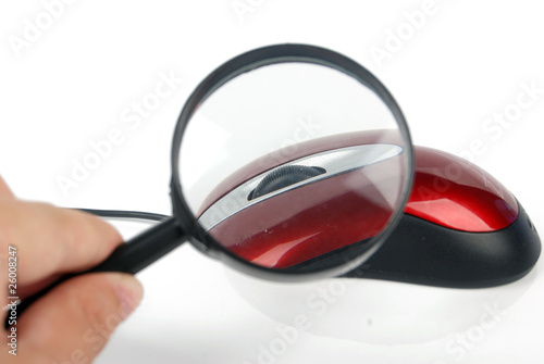 magnifying glass with computer mouse