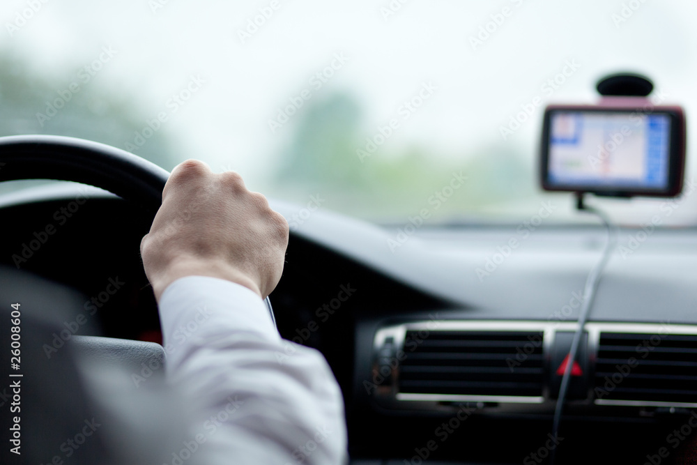 man driving a car with his hands on the steering wheel man driving a car with his hands on the steering wheel
