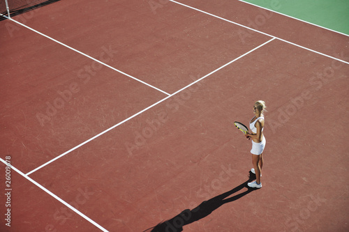 young woman play tennis © .shock