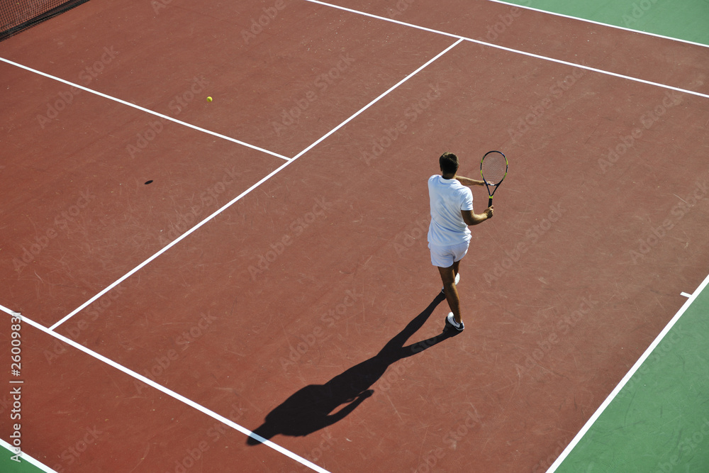Fototapeta premium young man play tennis outdoor