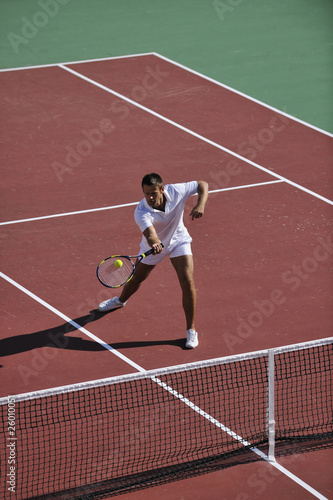 young man play tennis outdoor © .shock