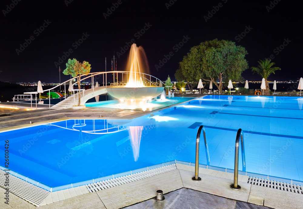 Water pool and fountain at night