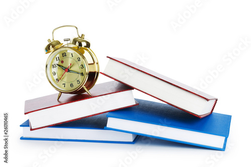 Back to school concept with books and clock