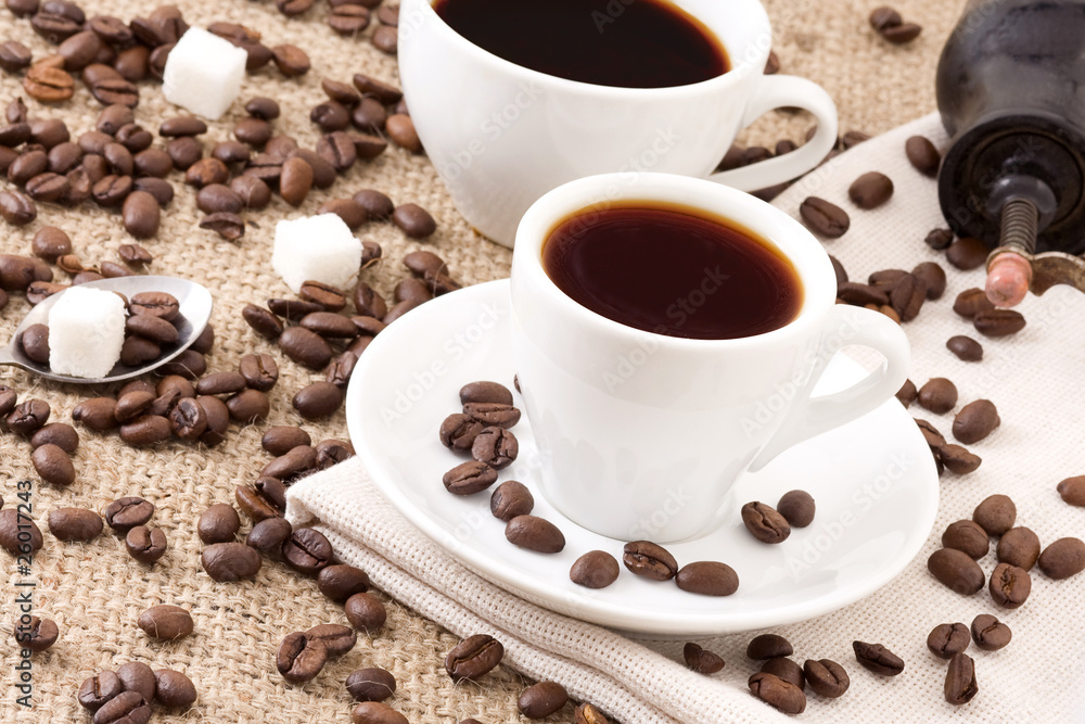 cups of coffee and grinder cups of coffee and grinder