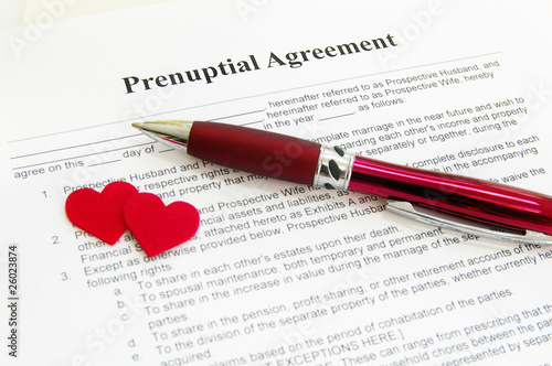 prenuptial agreement with two red hearts photo
