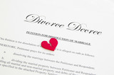 broken red heart on a divorce document