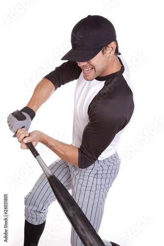 man swinging bat hard