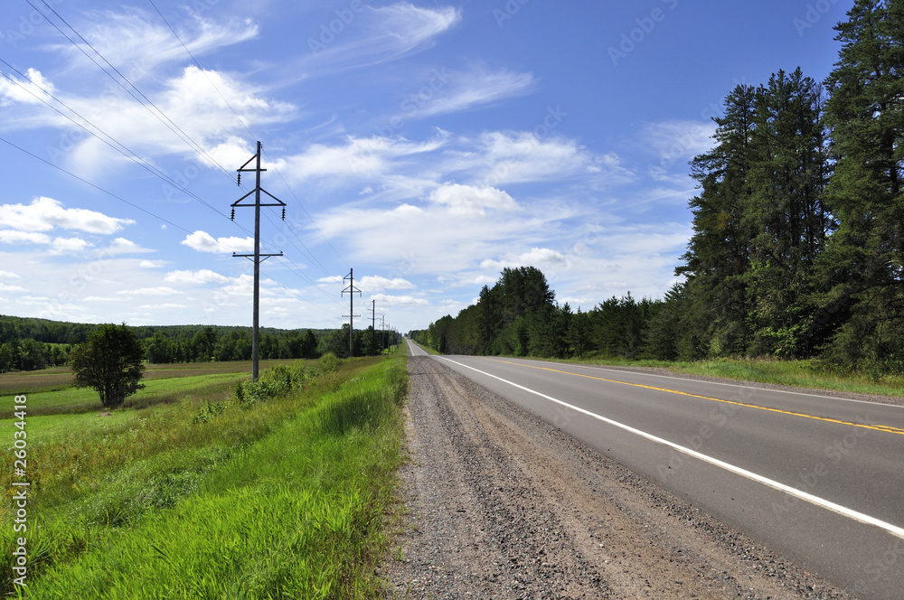 summer road with sky and power line