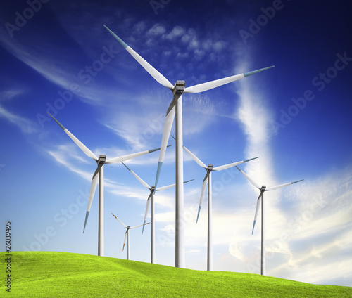 Windmill on green field