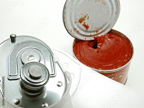 canned tomato paste and tin opener