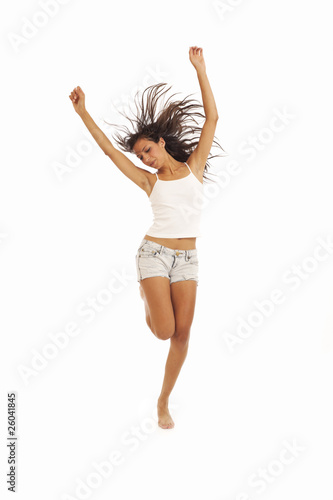 Cute young energetic girl dancing