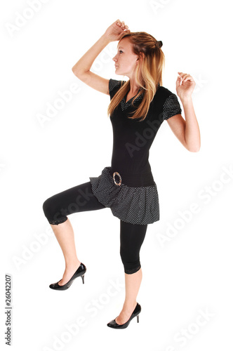 Girl dancing in studio.