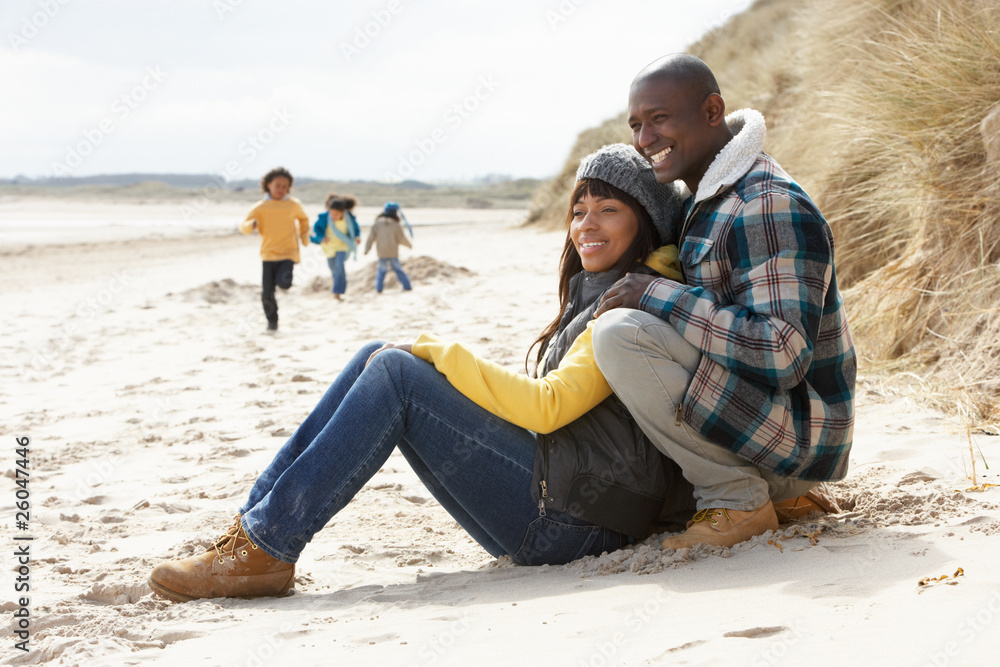 Fototapeta premium Family Having Fun On Winter Beach
