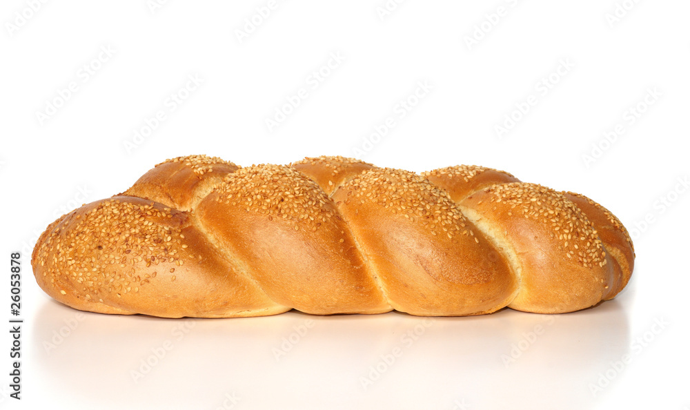 Challah with sesame seeds isolated on white