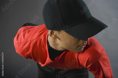 Mixed race baseball pitcher