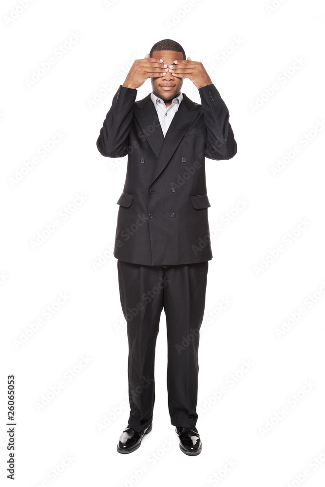 See No Evil - African American businessman isolated on white See No Evil - African American businessman isolated on white