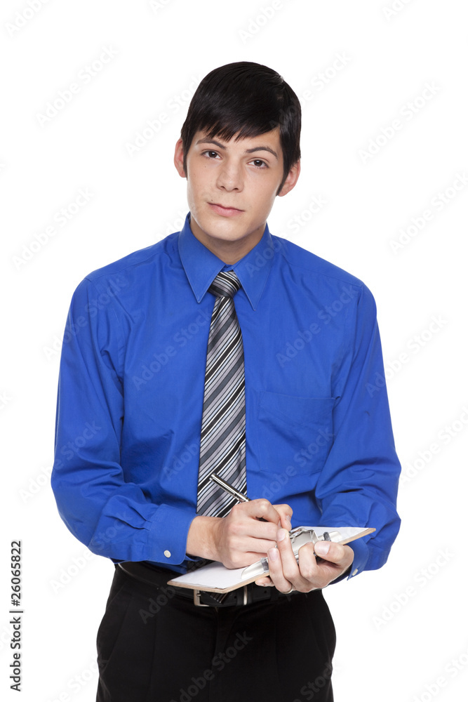 Caucasian businessman writing on blank clipboard Caucasian businessman writing on blank clipboard