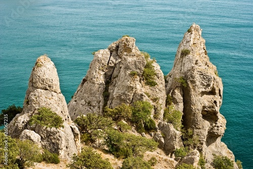 beautiful rocks on a emerald sea background