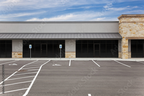 Strip Mall - Blank Signs and Parking Lot photo
