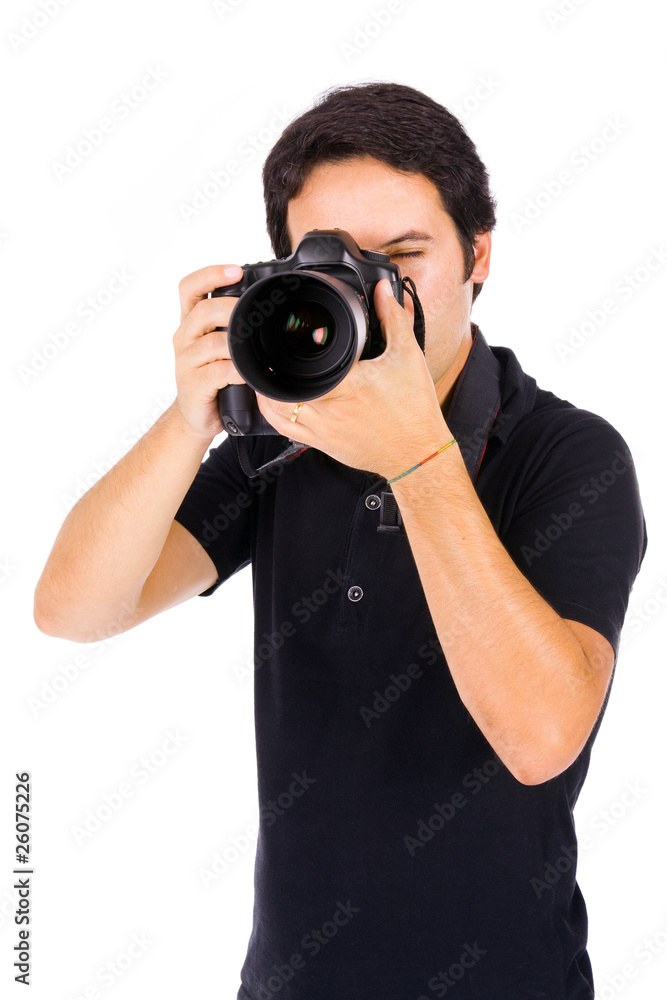 Young male photographer at studio, isolated on white Young male photographer at studio, isolated on white