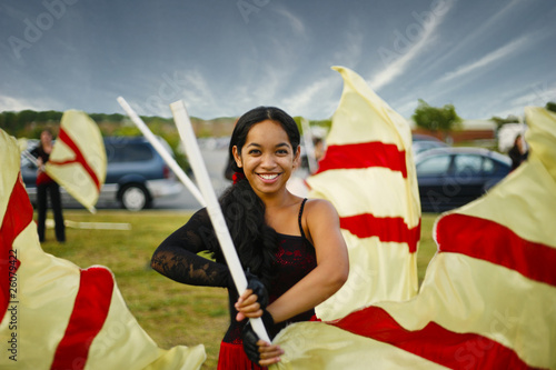 Pacific Islander girl flag twirling photo