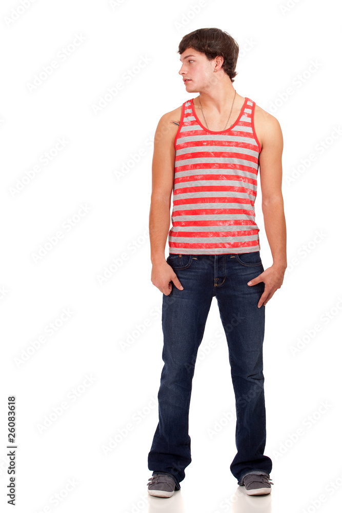 Obraz premium Young man in red and white striped shirt and jeans.