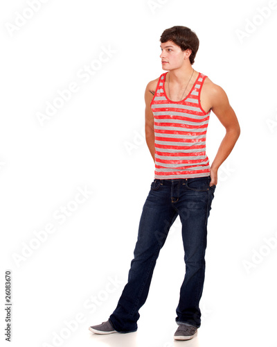 Young man in red and white striped shirt and jeans.