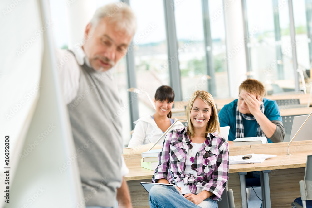 Fototapeta premium High school - three students with mature professor