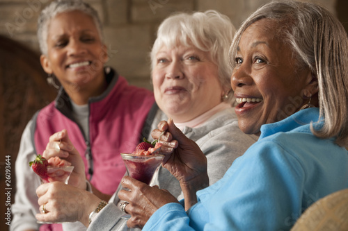 Friends eating dessert in restaurant