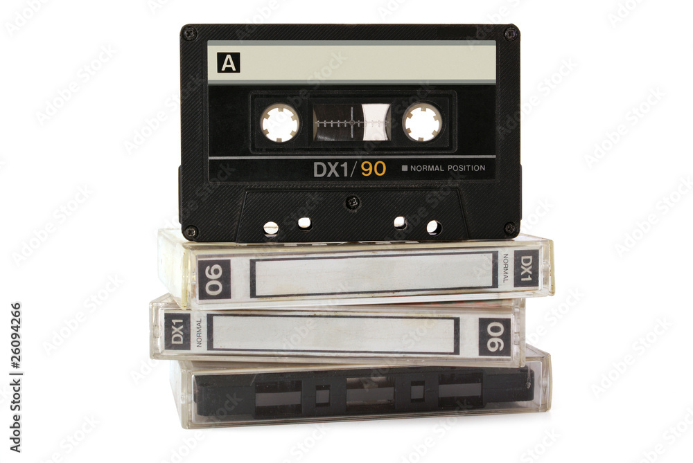 Obraz premium Audio cassette on three boxes isolated on white background