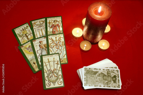 Tarot cards with candles