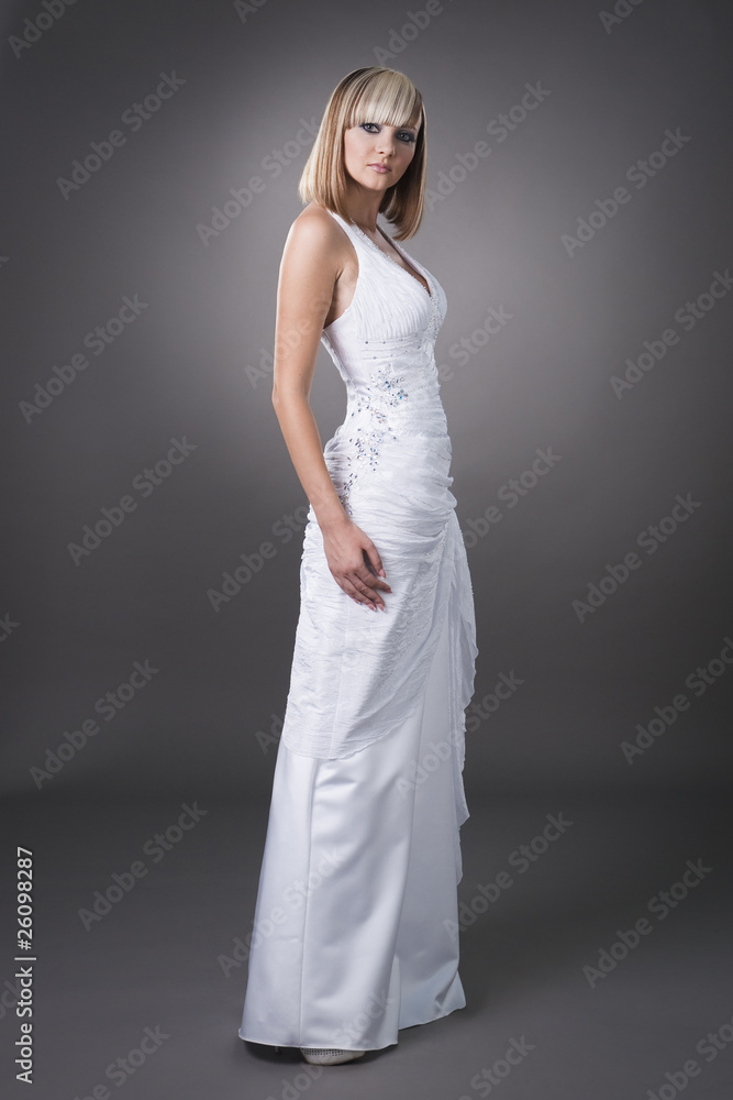assured bride wearing on long wedding dress