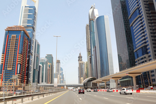 General view on trunk road and skyscrapers
