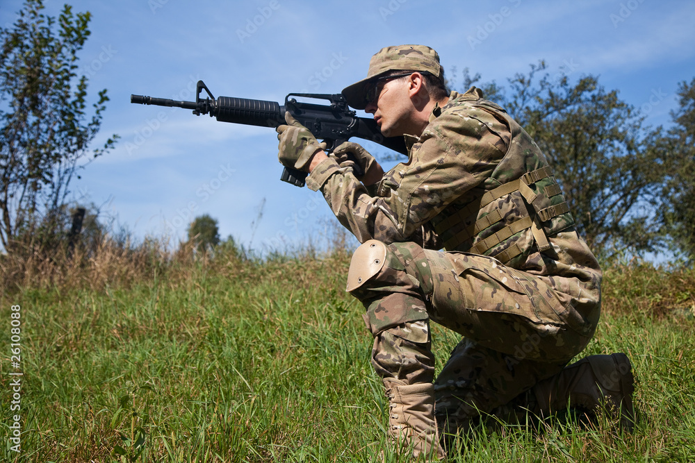 Fototapeta premium Soldier with a rifle