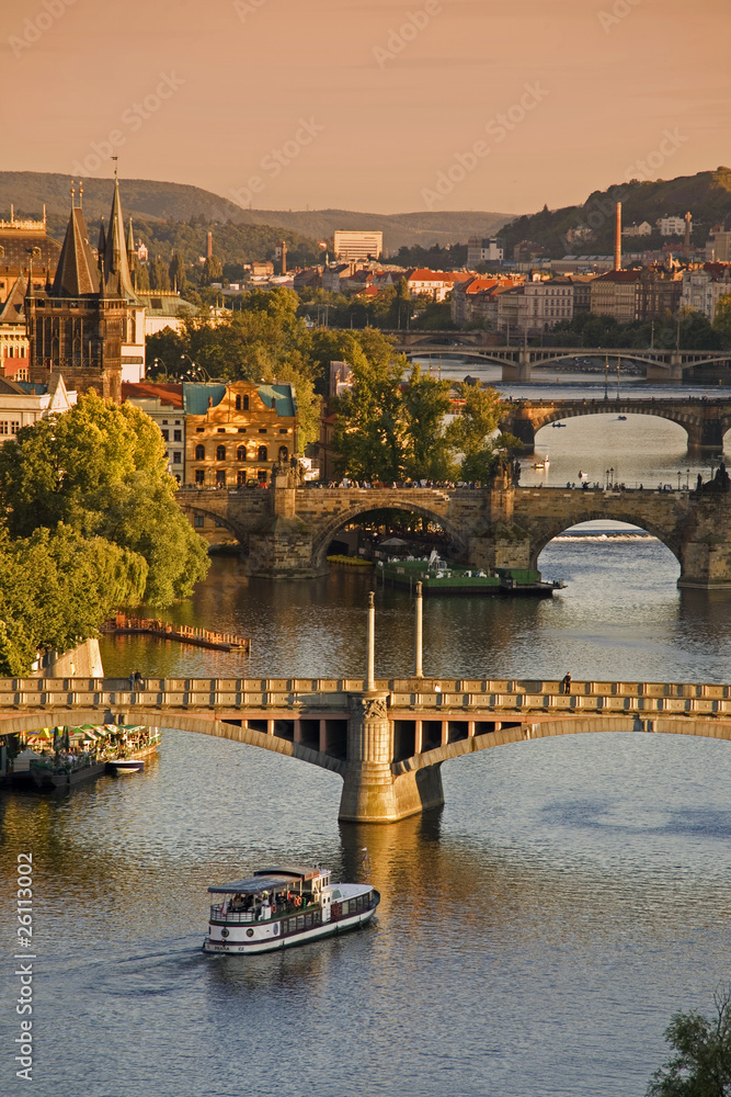 Obraz premium Bridges in Prague over the river Vltava at sunset