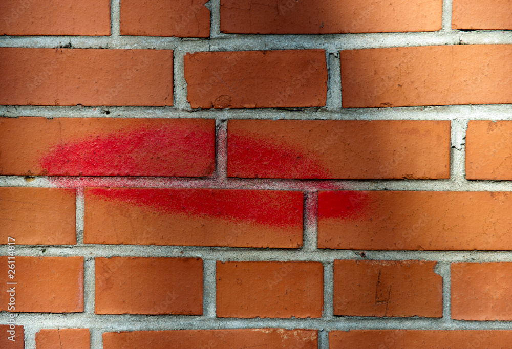 Fototapeta premium Brick wall with kiss gra
