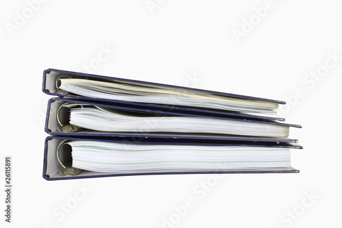Folder stack with papers on white background.