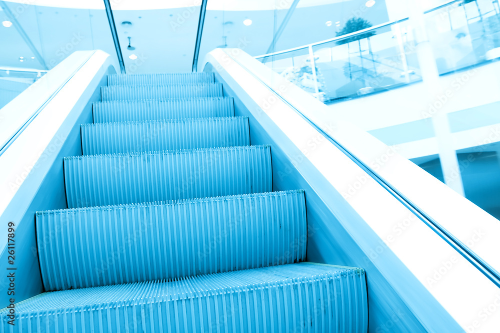 Fototapeta premium perspective view to moving staircase in metro station