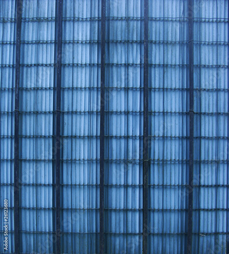 part of a blue colored fence