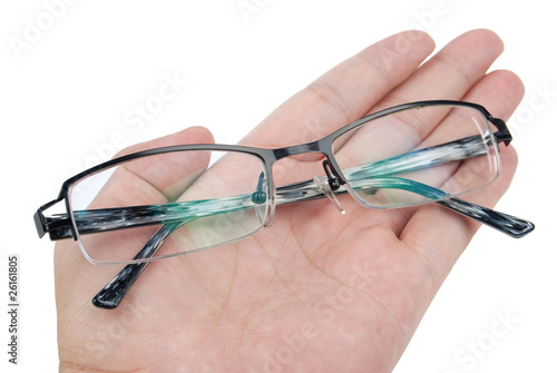 eyeglasses in hand